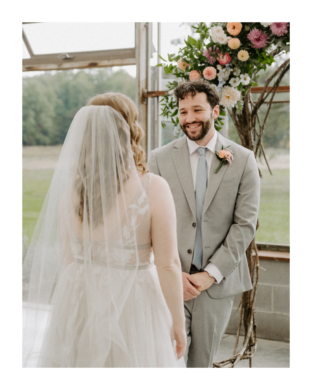 Groom seeing his bride for the first time at Jorgensen Farms in Westerville, Ohio, captured by Ashley Wallace Photography. Emotional, heartfelt first look at a rustic wedding venue.